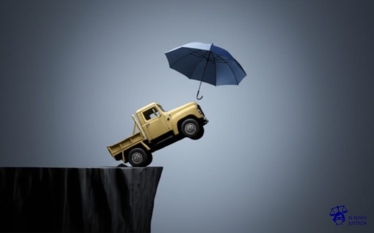 Un camión de mudanzas a punto de caer por un precipicio, con un pequeño paraguas abierto intentando protegerlo. Representa: Disputas sobre cobertura en seguros de transporte de mercancías