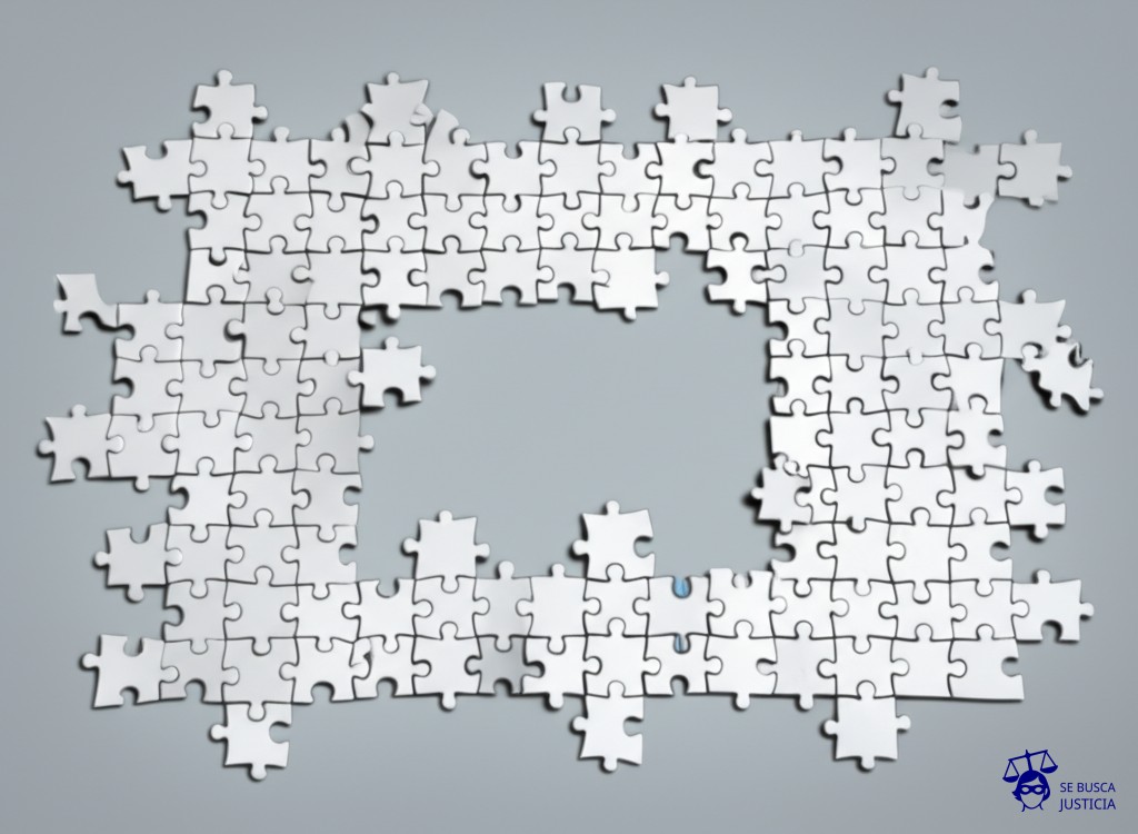 Un enorme rompecabezas desarmado, con piezas dispersas en una mesa, cada pieza intentando encajar en un borde diferente, sin que ninguna encaje con otra. Representa: Tráfico transnacional de personas sin respuesta coordinada entre Estados