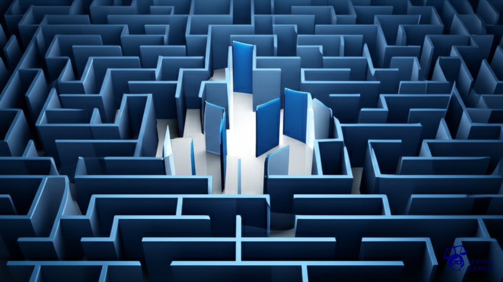 Un laberinto con múltiples entradas y salidas, pero todas las salidas están bloqueadas por un muro de espejos. Representa: Problemas constitucionales relacionados con la participación ciudadana en la toma de decisiones públicas y el acceso a la información gubernamental.